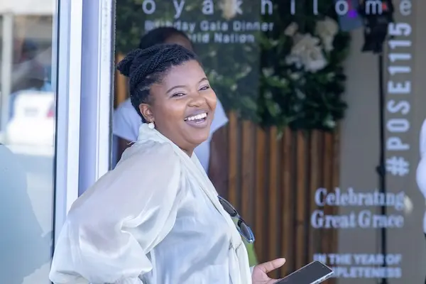Smiling usher
