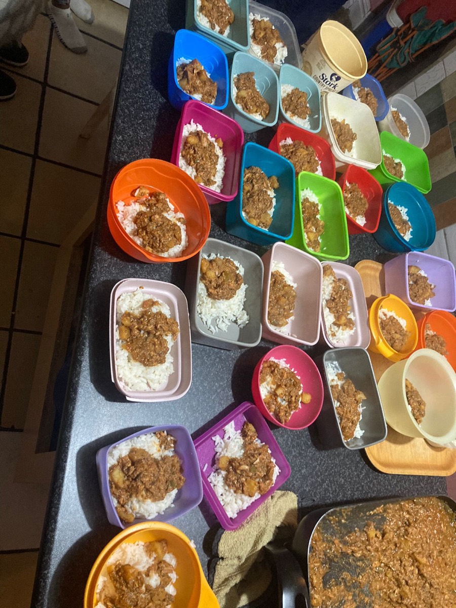 Dozens of meals dished up and ready to be handed out